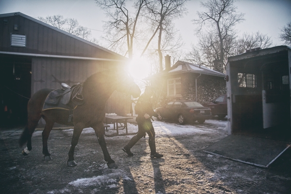 The sun rises over the DMPD barn in Palmer Park