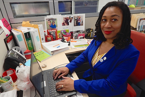 Regina Ann Campbell at her desk in TechTown