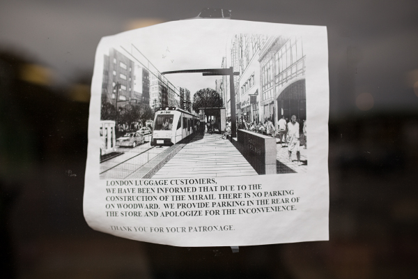 Construction notice for patrons of the London Luggage Shop on Woodward at Antoinette