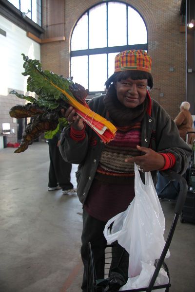 Ila Tucker shops at Eastern Market with the help of Senior Market Days.