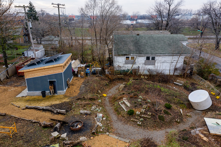 Graem Whyte, co-founder of Popp's Packing, exists the tool library behind Popp's Emporium