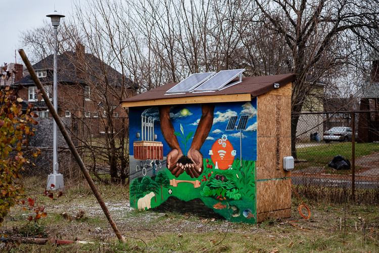 Tool shed with mural by Waleed Johnson