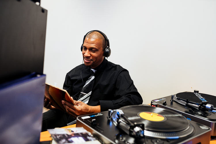 Morris Porter selects a record at WNUC