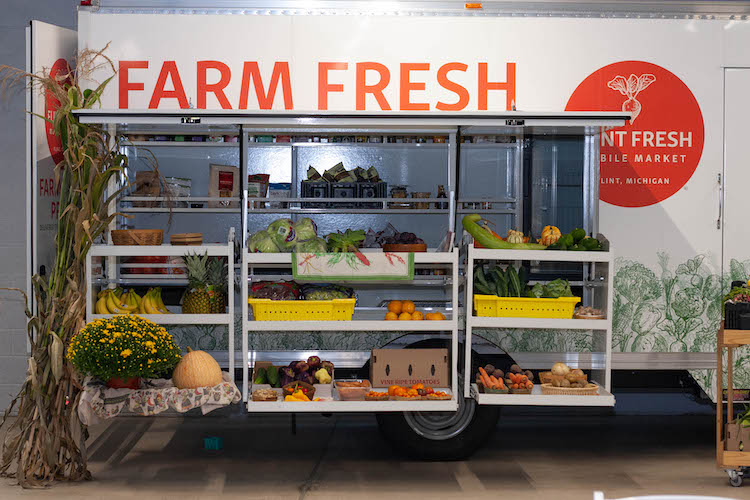 Each week, Flint Fresh sets up mobile markets at a half-dozen to a dozen sites with food sourced from local growers.