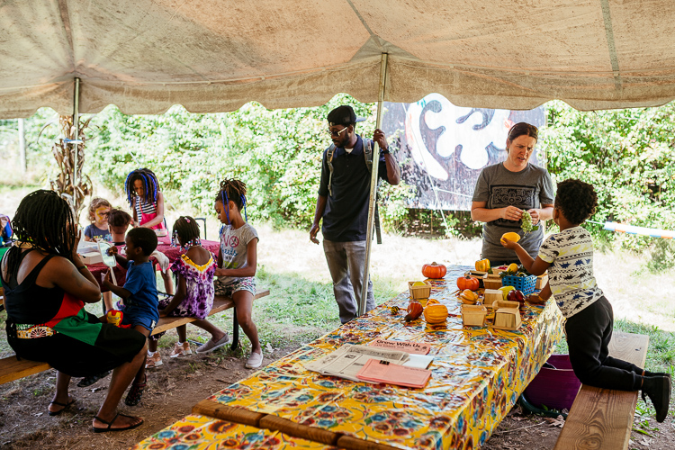 A tent for Children's activities, called the Children's Village, at the D-Town Farms Harvest Festival