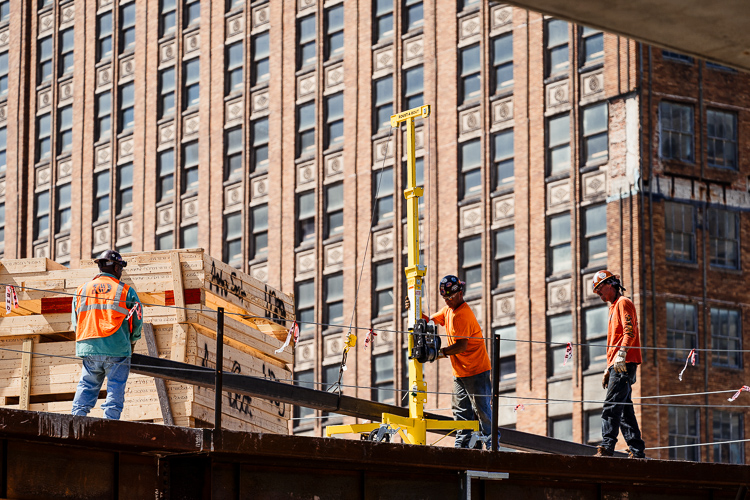 Construction workers at a project near Grand Circus Park on Washington Boulevard