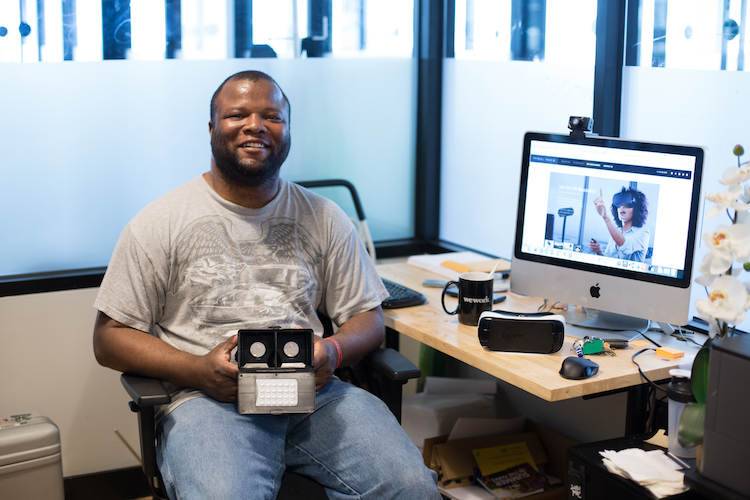 Seann Lewis shows up his company's VR headset