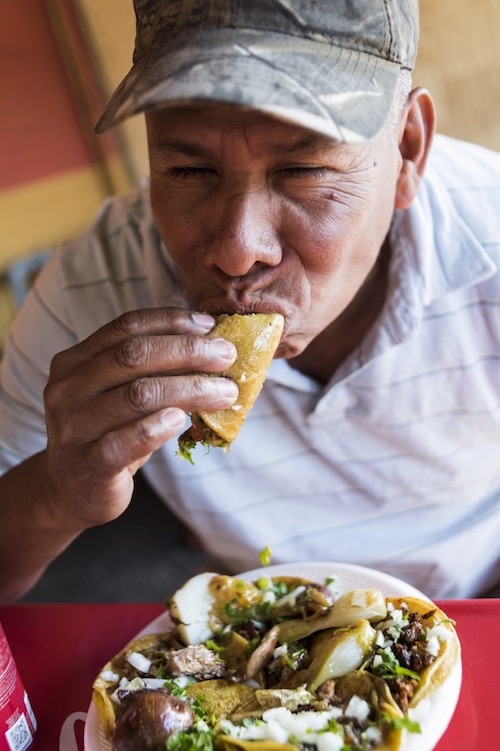 Eating a taco from El Parian