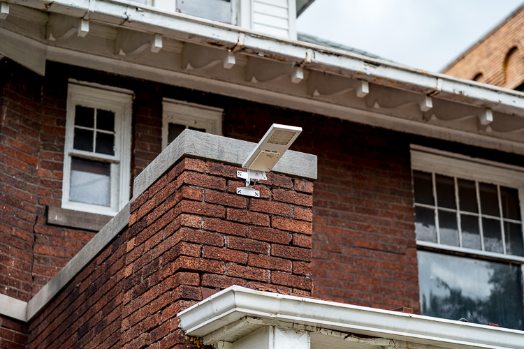 Solar-powered porch light outside Cooperation Group's office
