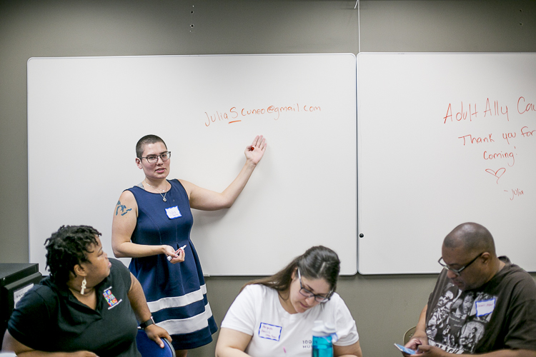 Organizer Julia Cuneo speaks during the "Adult Allies Caucus"