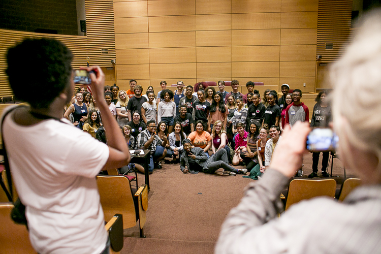 Summit-goers take a group photo