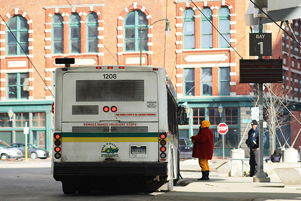Waiting for the bus at the downtown terminal