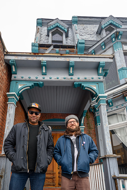 Adriel Thornton and Aaron Anderson standing outside the former Zoot's location
