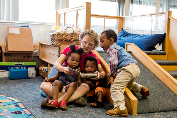 Michelle Smith reads to kids at Starfish Early Head Start in Inkster