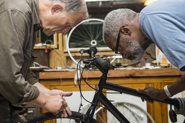 Working on a bike at Church of the Messiah