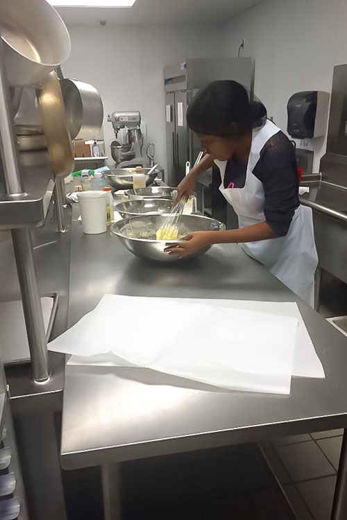 Simmons at work in the kitchen