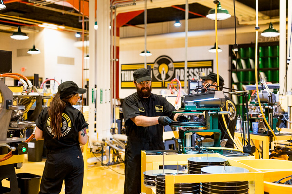 Alejandra Villegas and Doc Holoweski are both press operators at Third Man Records