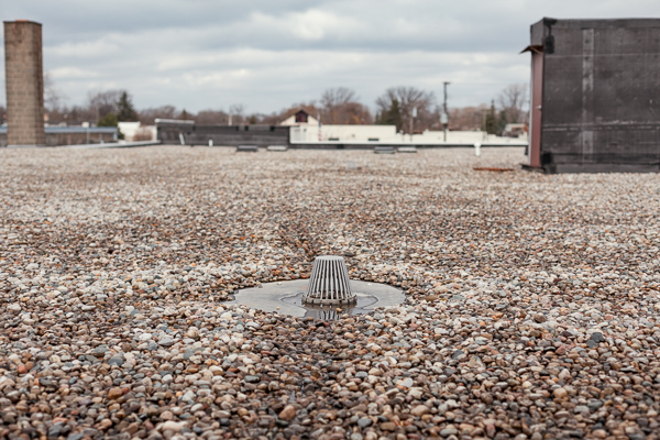 A drain on the roof of Milton Manufacturing's facility
