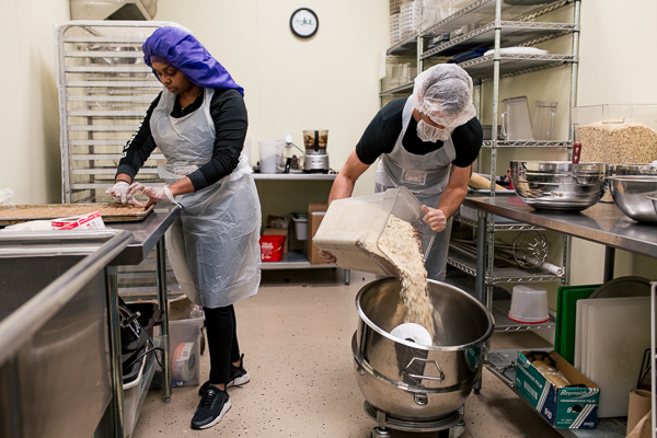 Takyhai Burns and Jacob Schoenknecht making Mitten Bites