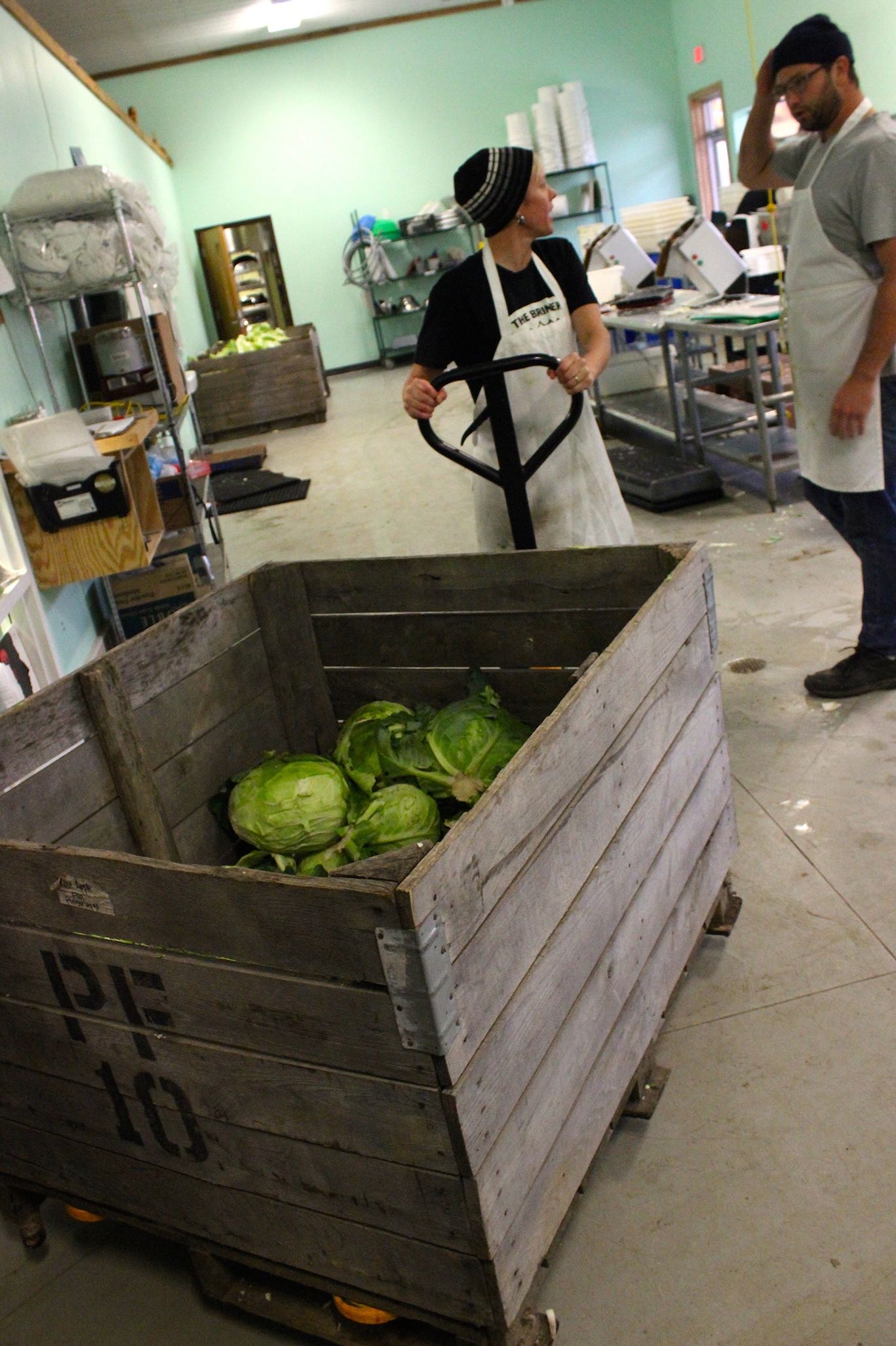 Prepping produce for fermentation at The Brinery