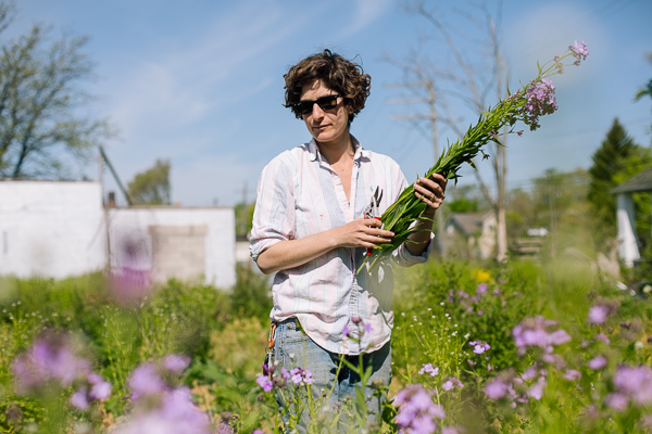 Pappas holding a bundle of wild brassica
