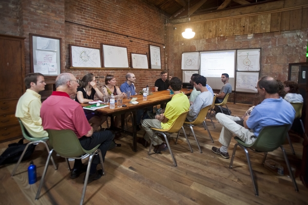 Tom Brennan and residents during a meeting at the Green Garage