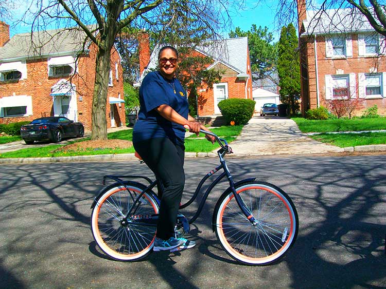 Patrice Stringer's favorite neighborhood activity is riding her bike, Photo by David Sands.
