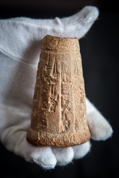 Sumerian clay cone featuring cuneiform inscriptions
