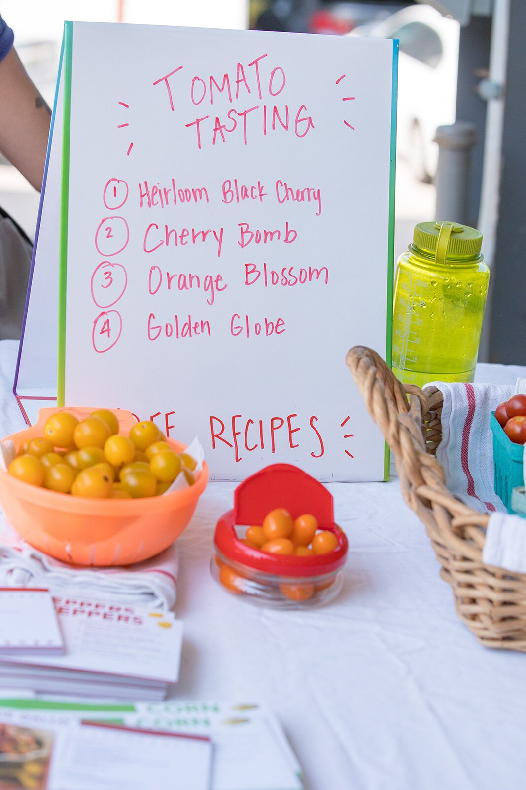 A tomato tasting station set up by Farmers Market Food Navigators.