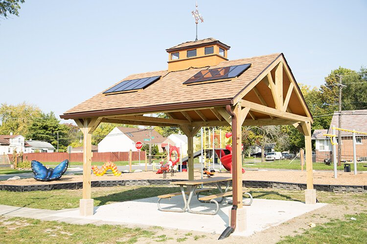 A new pavilion provides solar-powered USB charging ports for visitors to the Minock-Whitlock Park in Warrendale. 