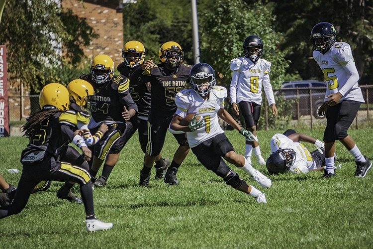 Local teams the Oldtown Ducks vs the Westside Steelers face off in a game earlier this fall.