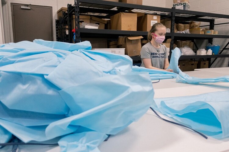 Hannah Miles, pattern maker and sewer, works on PPE production at GETTEES in Sterling Heights. 
