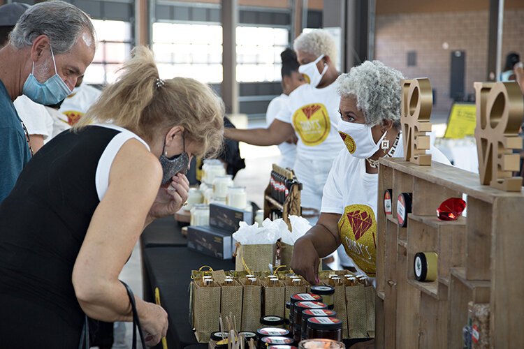 The family behind Ruby's Natural Hair Care vending at Detroit's Eastern Market. 
