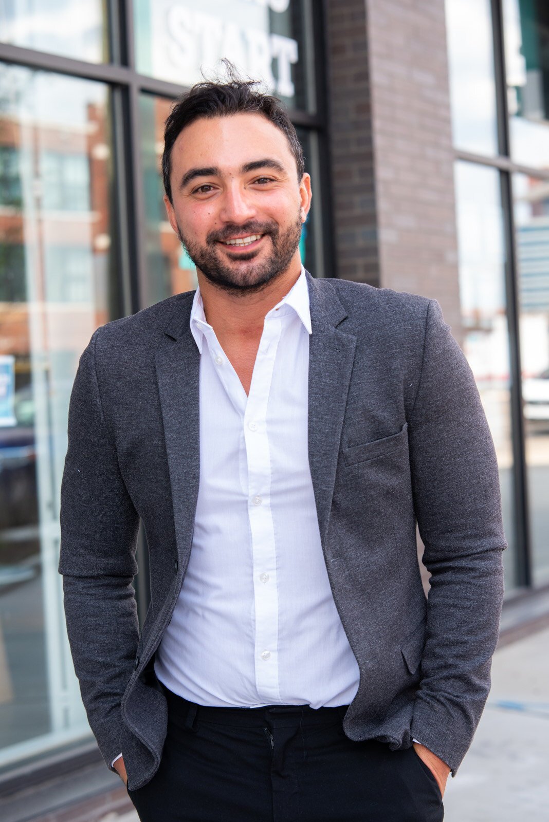 Evan Adams worked with Phil Knight on gathering funding for his KIVA loan. Photo by Katie Alexis Photography.