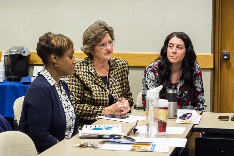 Battle Creek Public Schools Superintendent Kim Carter; Battle Creek Community Foundation President and CEO Brenda Hunt; and Meghan Taft, limited license psychologist at Summit Pointe, at a Bearcat Meeting.