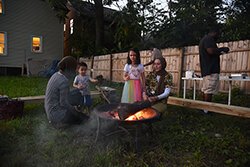 After an event for Detroit Art Week, people enjoyed a campfire at Indus Detroit gallery space with halal s'mores.