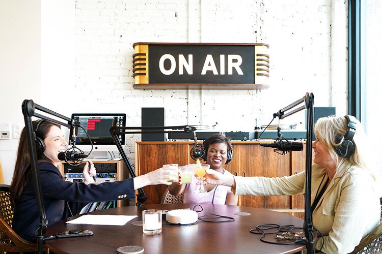 "A Drink With" founder Hillary Sawchuk, Goodwill Industries Vice President of Marketing and External Affairs Jessica McCall, and Shinola President Shannon Washburn. Photo courtesy A Drink With.