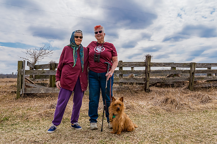 A couple hiking at Watkins Lake State Park and County Preserve. 