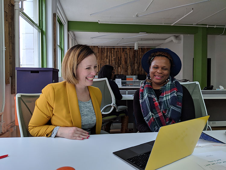 Laura Eagin consults with client at Bamboo Detroit. Photo by Anita Expert.