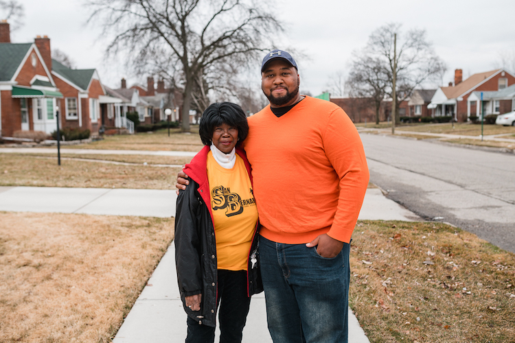 Dorothea O'Neil with Detroit Snow Team volunteer Marcus Cummings