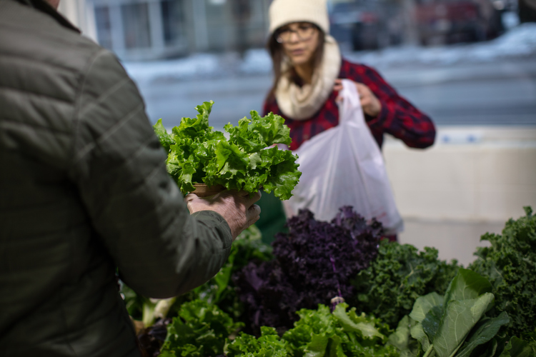 Green Wagon Farm produce stand at Fulton Street Farmers Market in Grand Rapids.