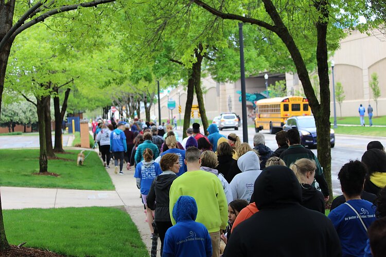 Community members of all ages walk to stomp out stigma.