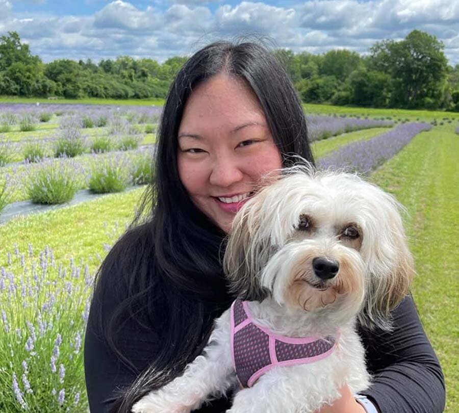 LAVENDER VISITOR: A customer with her dog visiting Romeo Lavender Farm in Bruce Township, Michigan. Photo: Courtesy of Nick Batsikouras.