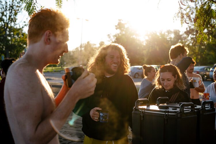 In center, Carlos Parisi gets coffee.
