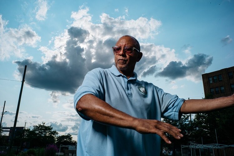 Gary Cabbil leads tai chi classes at Cool Cities Park.
