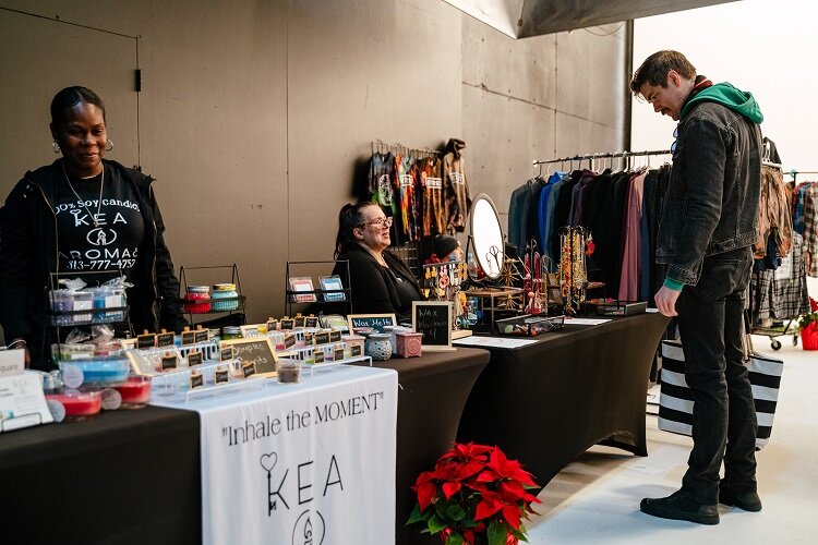 Vendors showcase their goods with the public at EWDC's holiday market. (Nick Hagen)