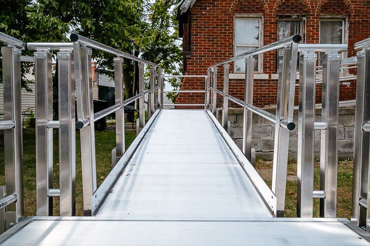 Schlann Dillard's new wheelchair ramp was made possible with an AMP grant.