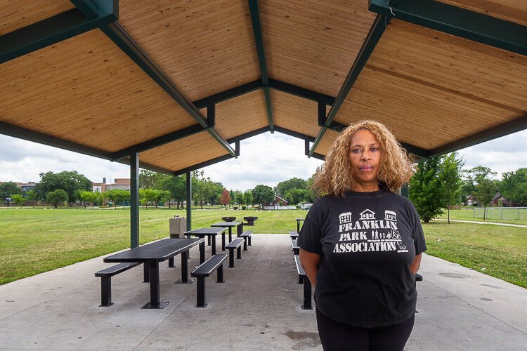 Bobbi Johnson of Franklin Park Community Alliance stands in front of the park's new pavilion.