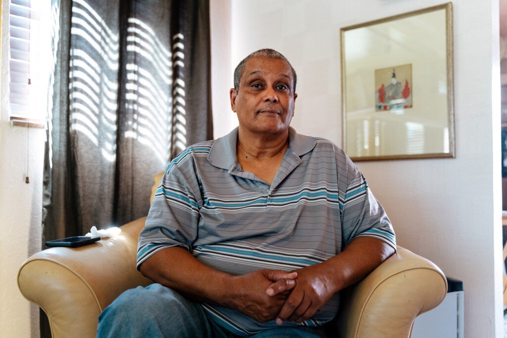 Robert Turner at home. No trees shade his house near 6 Mile and Schaefer. Photo by Nick Hagen.