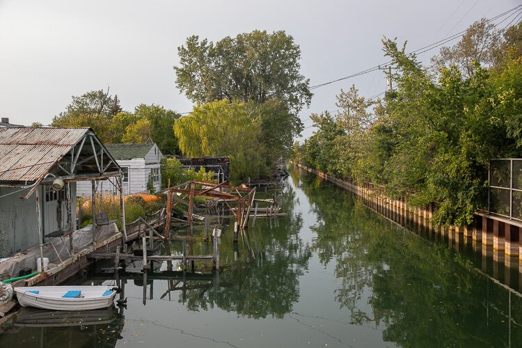 The Fox Creek Canals in Grosse Pointe have seen water levels rise with recent rainfall, prompting residents to add "tiger dams" to protect properties. Photo: David Lewinski.